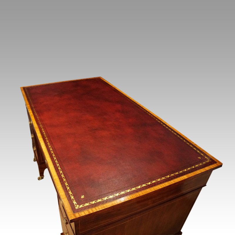 Edwardian inlaid mahogany pedestal desk