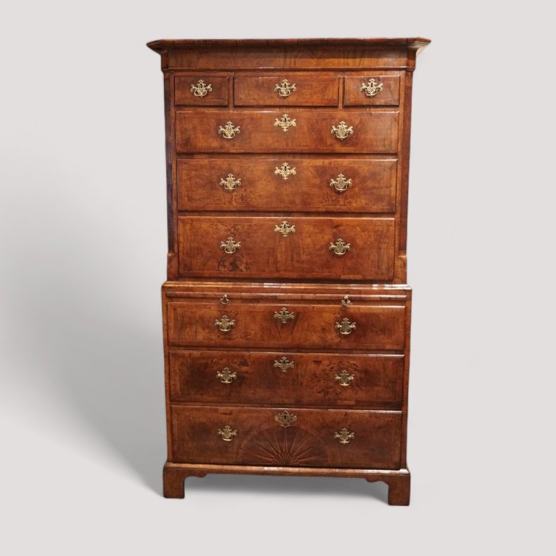 George II walnut tallboy with sunburst