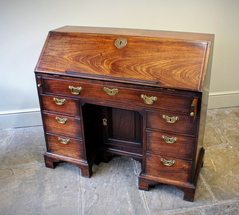 A Rare And Early Georgian Kneehole Bureau