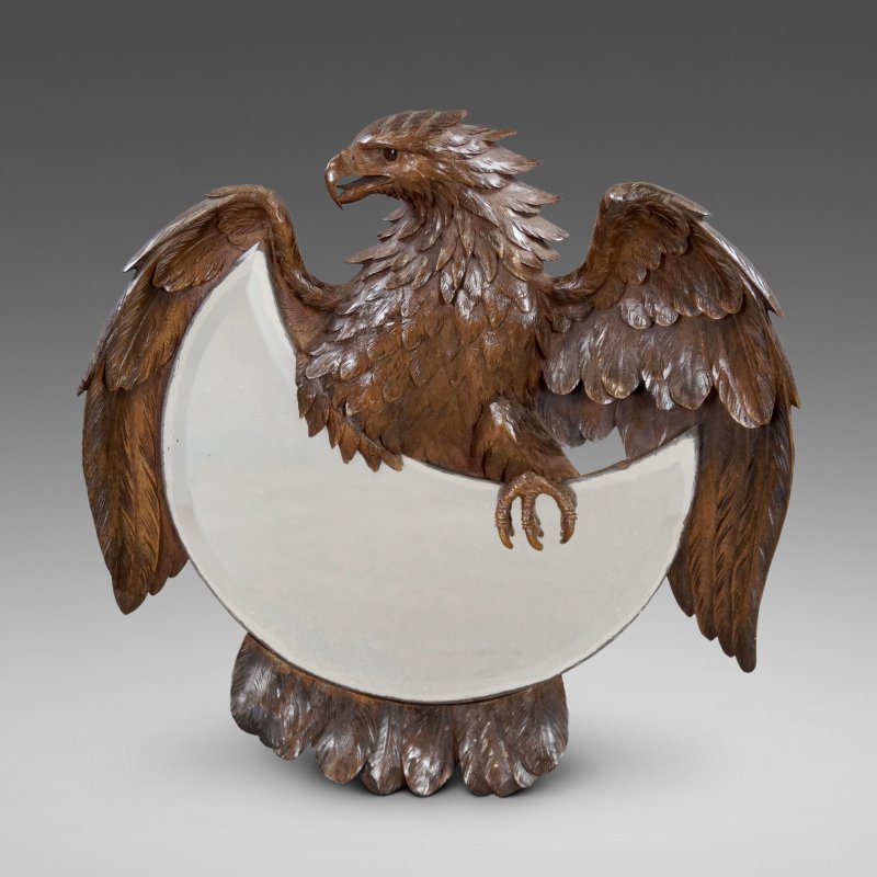 A Finely Carved Black Forest Mirror