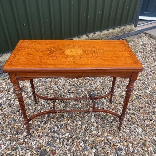 A Late Victorian Period Satinwood Fold Over Games Table.