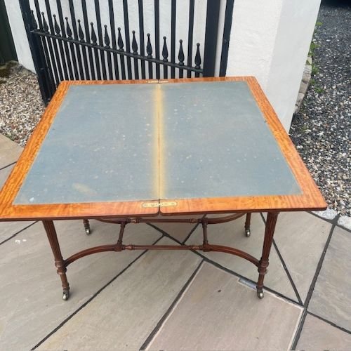 A Late Victorian Period Satinwood Fold Over Games Table.