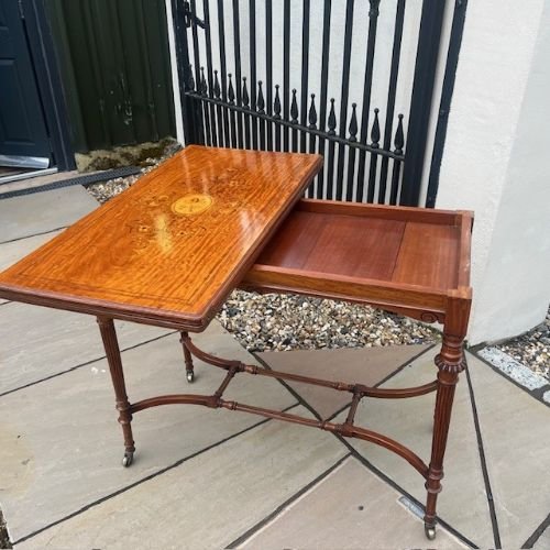 A Late Victorian Period Satinwood Fold Over Games Table.