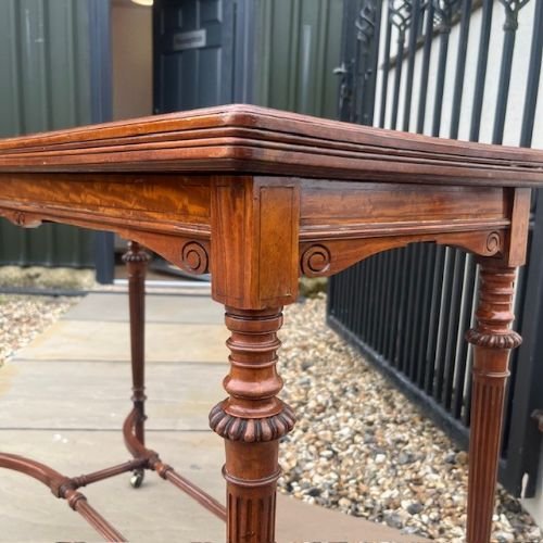 A Late Victorian Period Satinwood Fold Over Games Table.