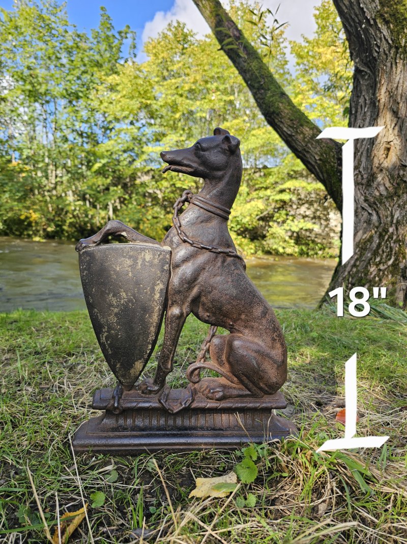 A country house cast iron armorial doorstop