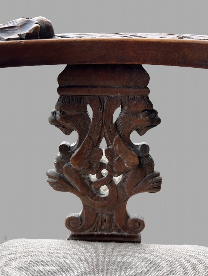 A Lovely Carved Italian Walnut Figural Corner Chair, c.1860