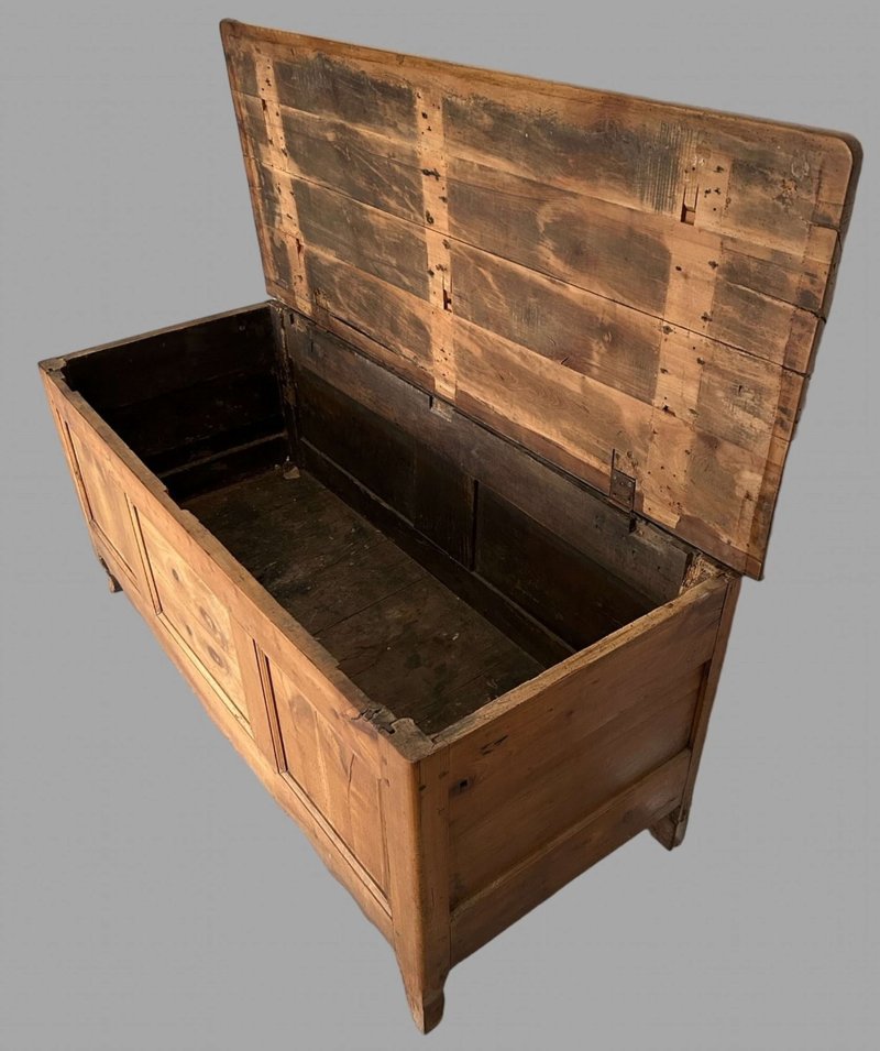 A Large Fruitwood Panelled Chest