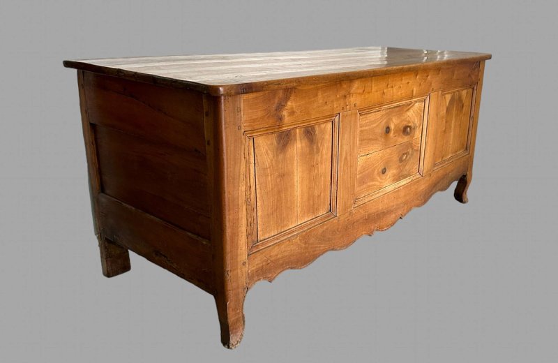 A Large Fruitwood Panelled Chest