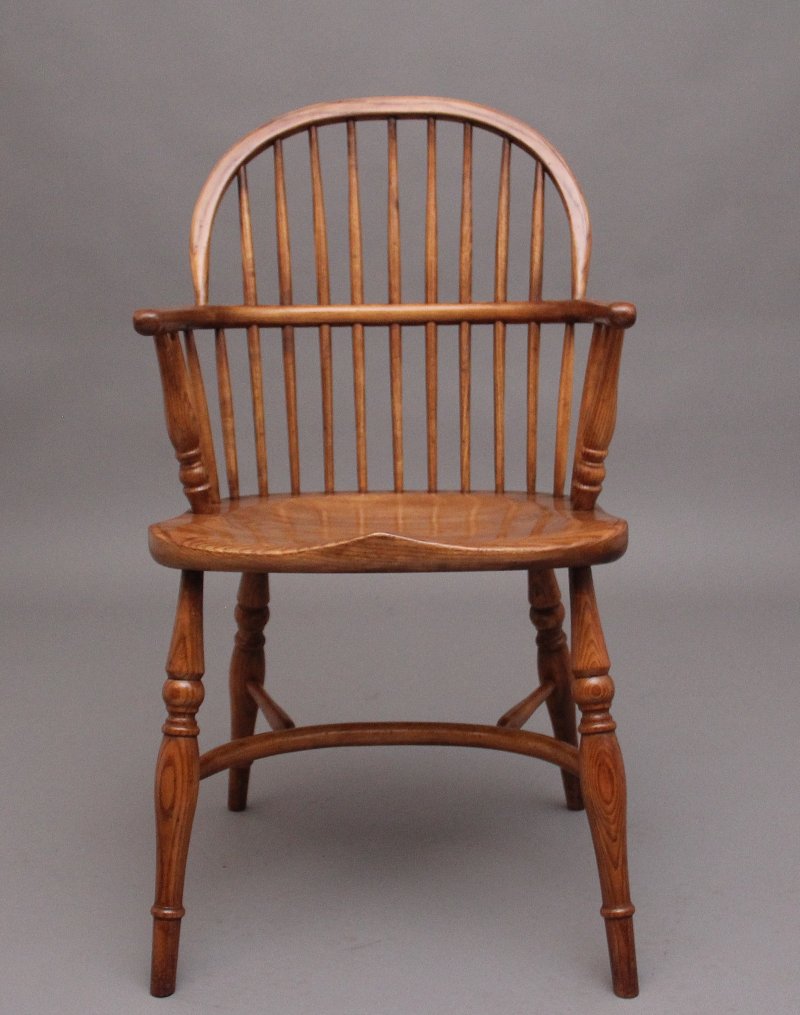 A set of six stick back Windsor armchairs