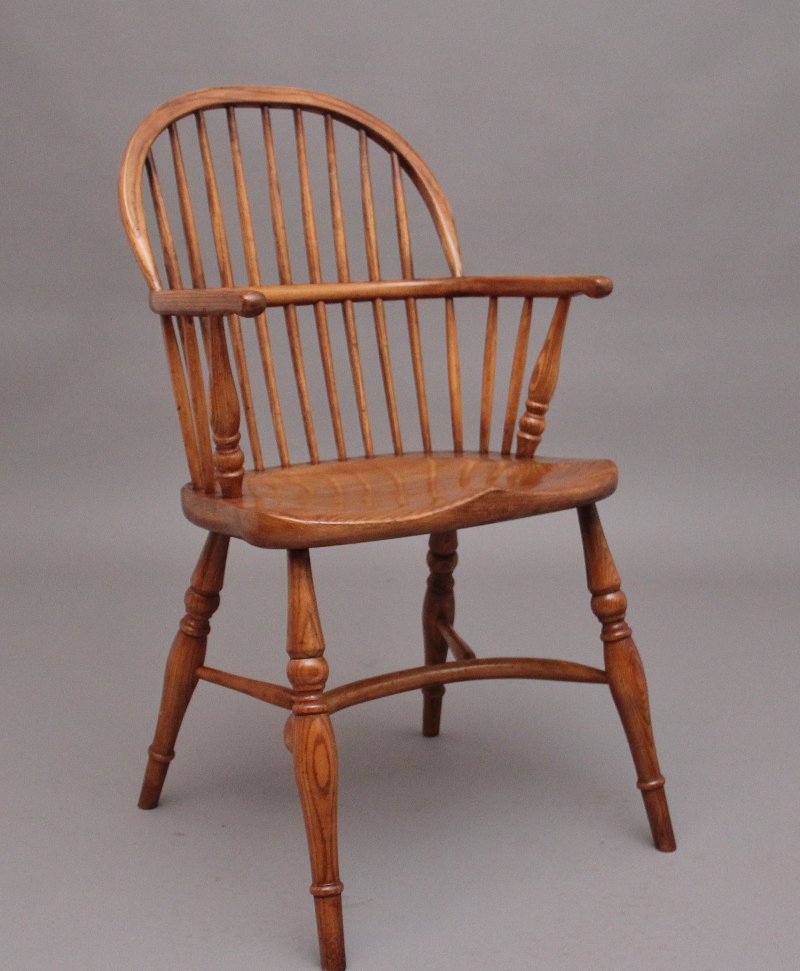 A set of six stick back Windsor armchairs