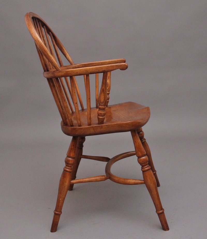 A set of six stick back Windsor armchairs
