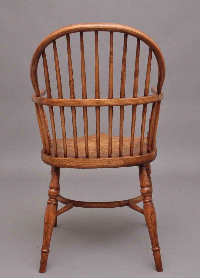 A set of six stick back Windsor armchairs