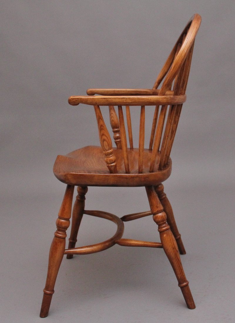 A set of six stick back Windsor armchairs