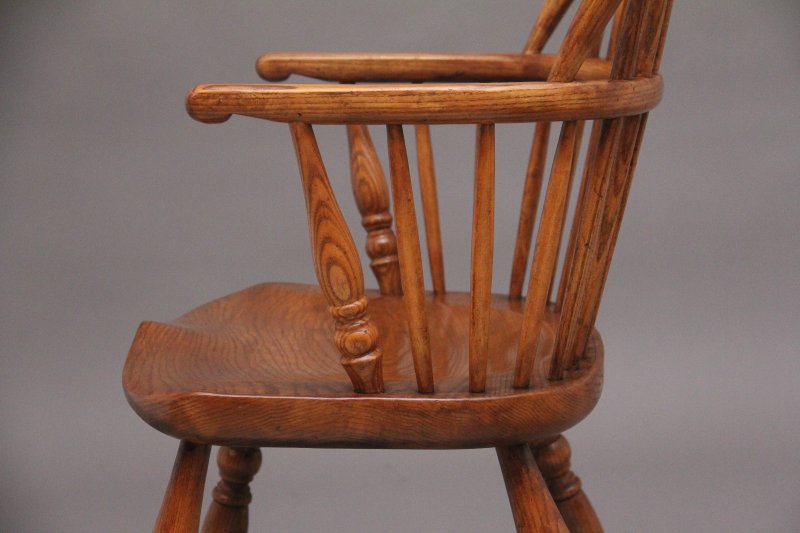 A set of six stick back Windsor armchairs