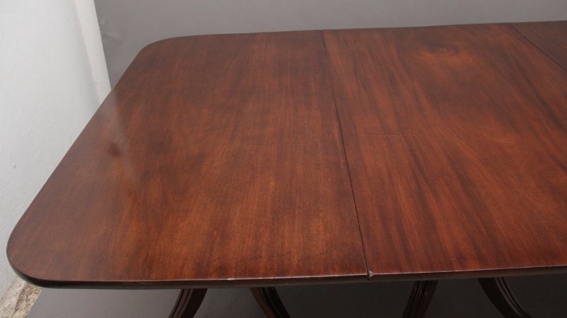 Early 19th Century mahogany three pedestal dining