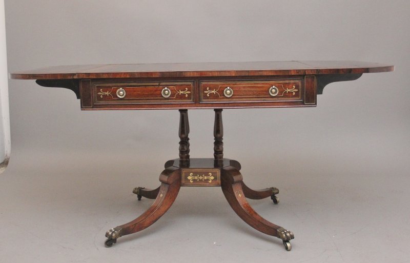 Regency rosewood and brass inlaid sofa table