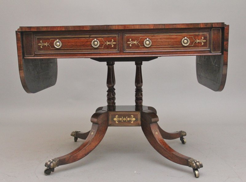 Regency rosewood and brass inlaid sofa table
