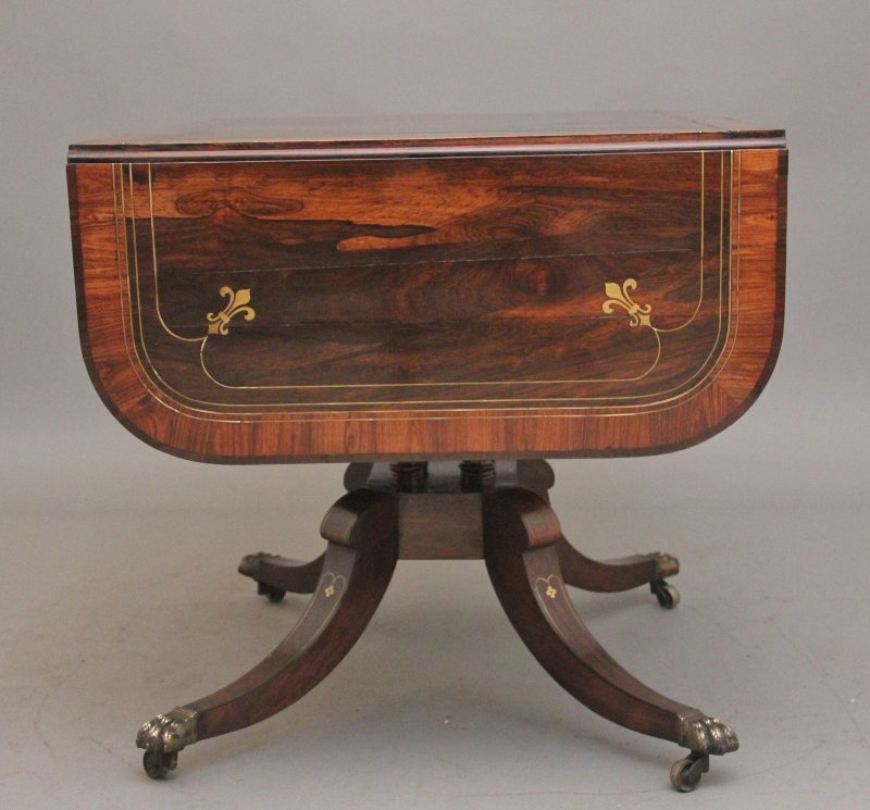 Regency rosewood and brass inlaid sofa table