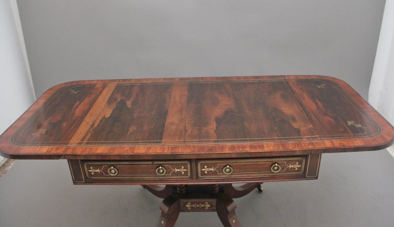 Regency rosewood and brass inlaid sofa table