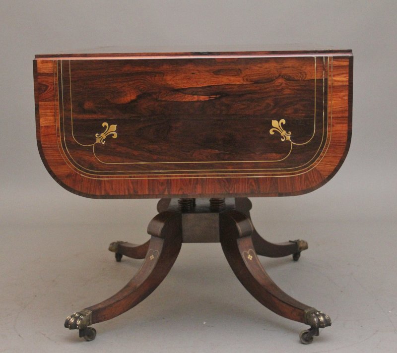 Regency rosewood and brass inlaid sofa table