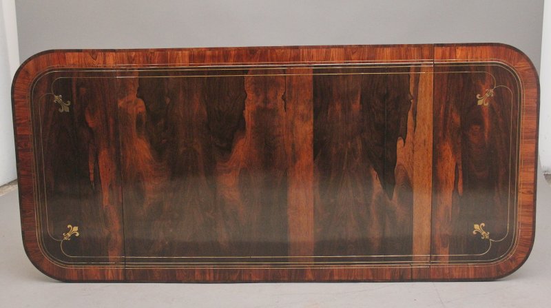 Regency rosewood and brass inlaid sofa table