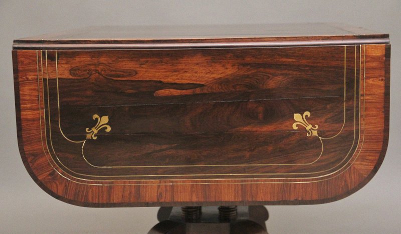 Regency rosewood and brass inlaid sofa table