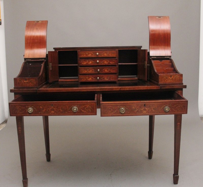 Pair of early 20th Century mahogany Carlton house desk's