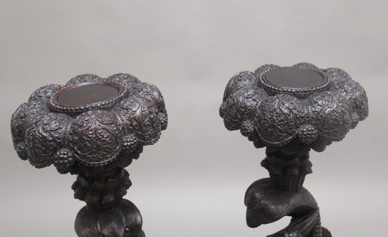 Pair 19th Century Anglo Indian carved torchers