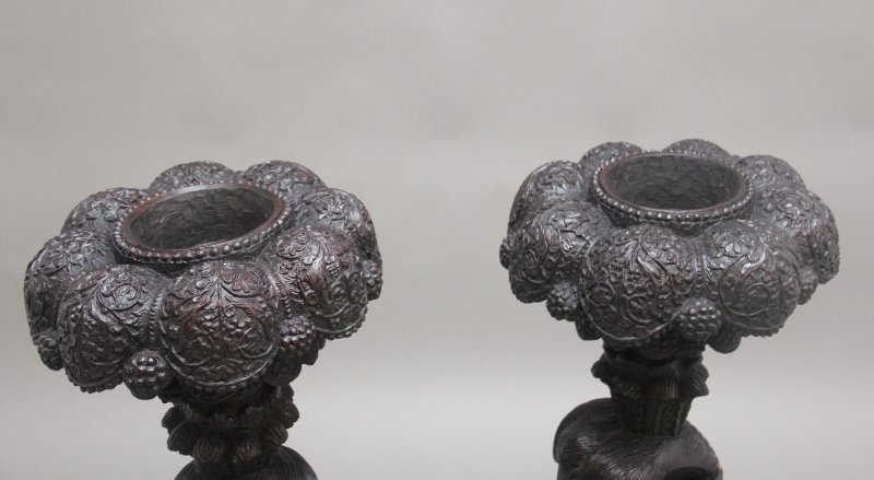Pair 19th Century Anglo Indian carved torchers