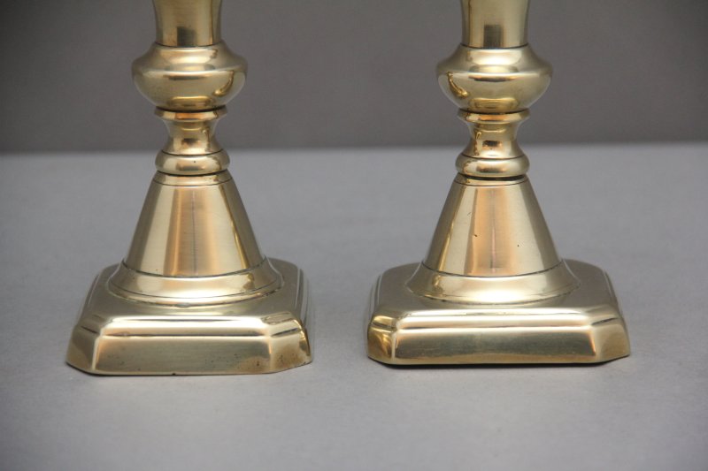 A pair of 19th Century brass candlesticks