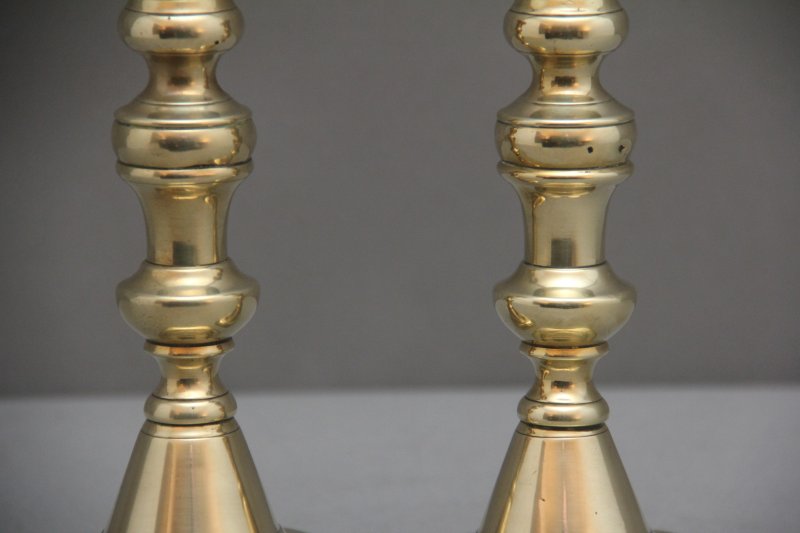 A pair of 19th Century brass candlesticks