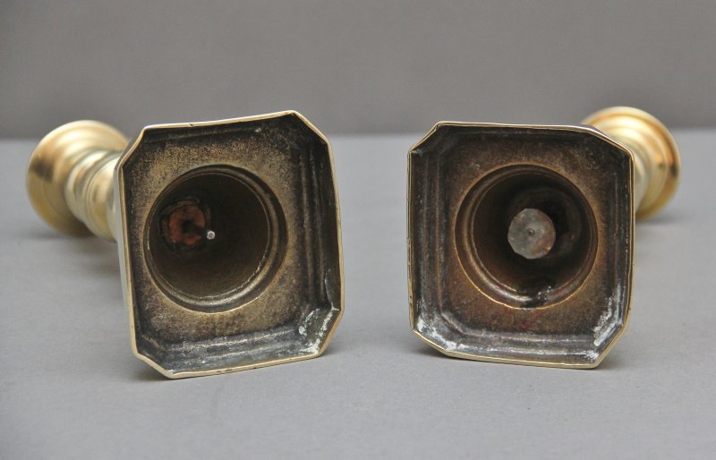 A pair of 19th Century brass candlesticks