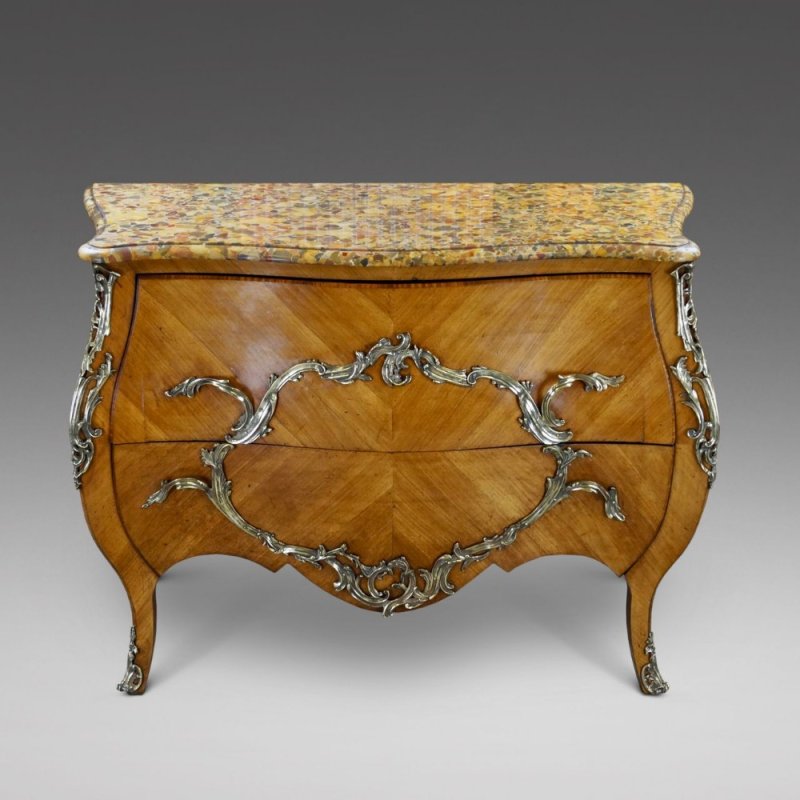 A 19th Century French Sabicu Bombe Commode
