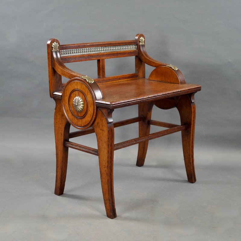 An Oak And Brass Mounted Hall Bench By James Shoolbred & Co.