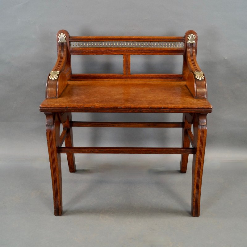 An Oak And Brass Mounted Hall Bench By James Shoolbred & Co.