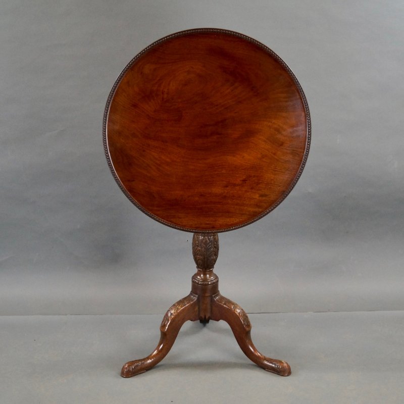 A Fine George III Carved Tripod Table