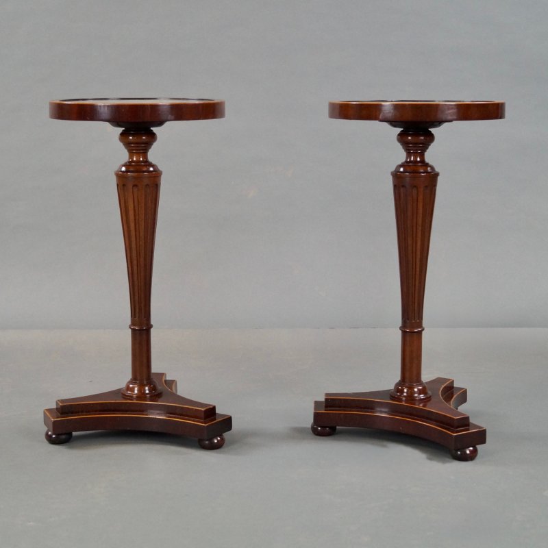 A Pair Of Mahogany Tripod Tables