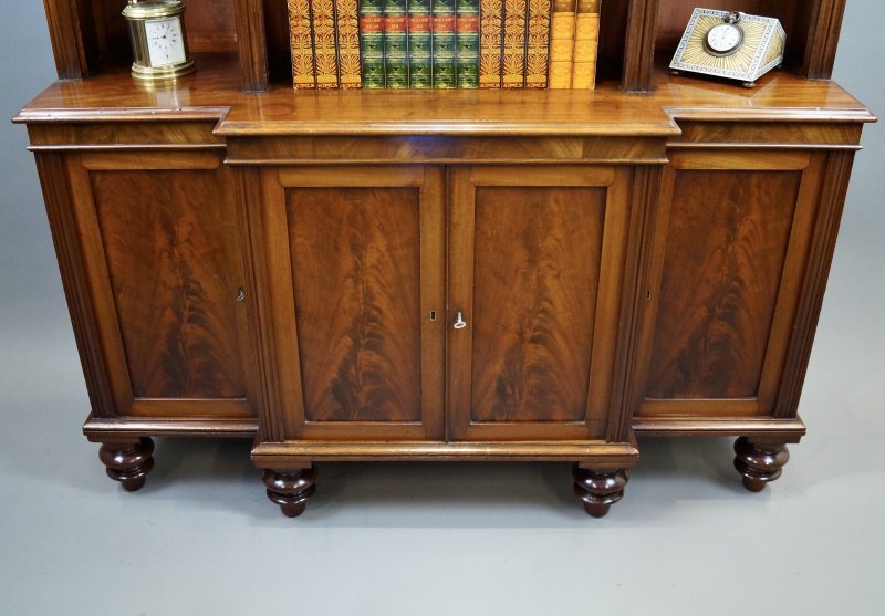 A Very Unusual & Dimunitive Mahogany Breakfront Bookcase