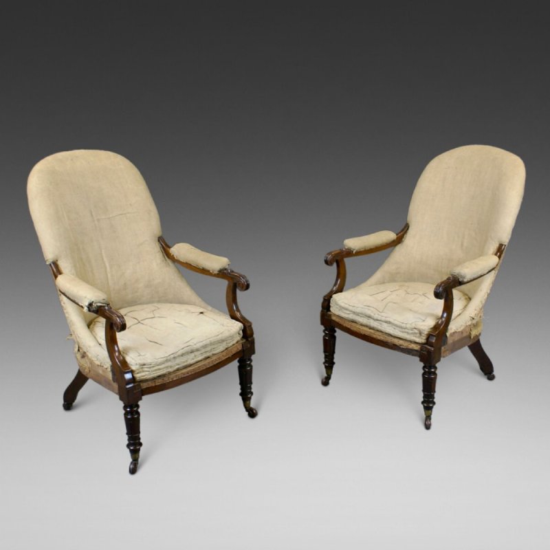 A Pair Of Victorian Rosewood Arm Chairs