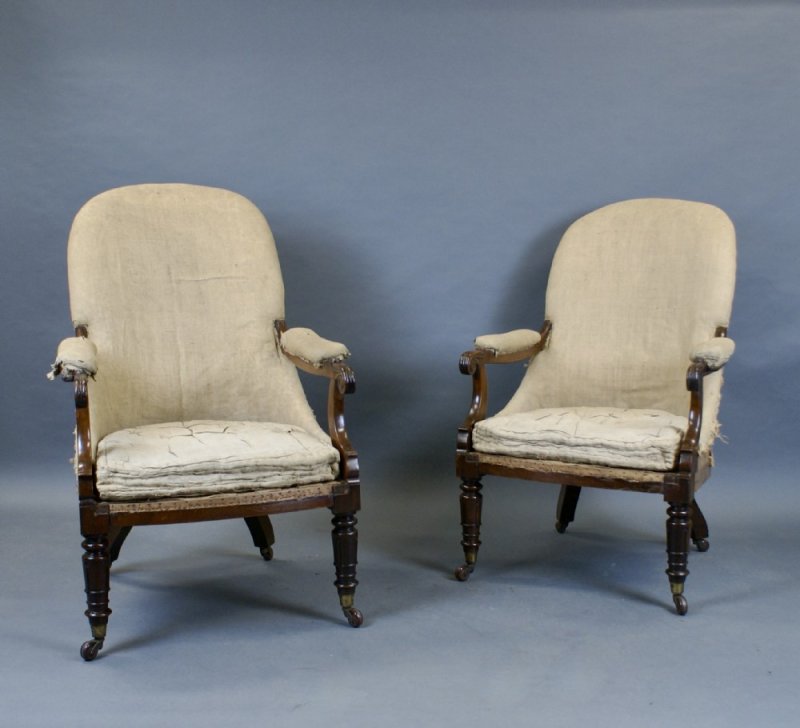 A Pair Of Victorian Rosewood Arm Chairs