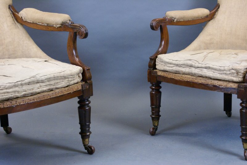 A Pair Of Victorian Rosewood Arm Chairs