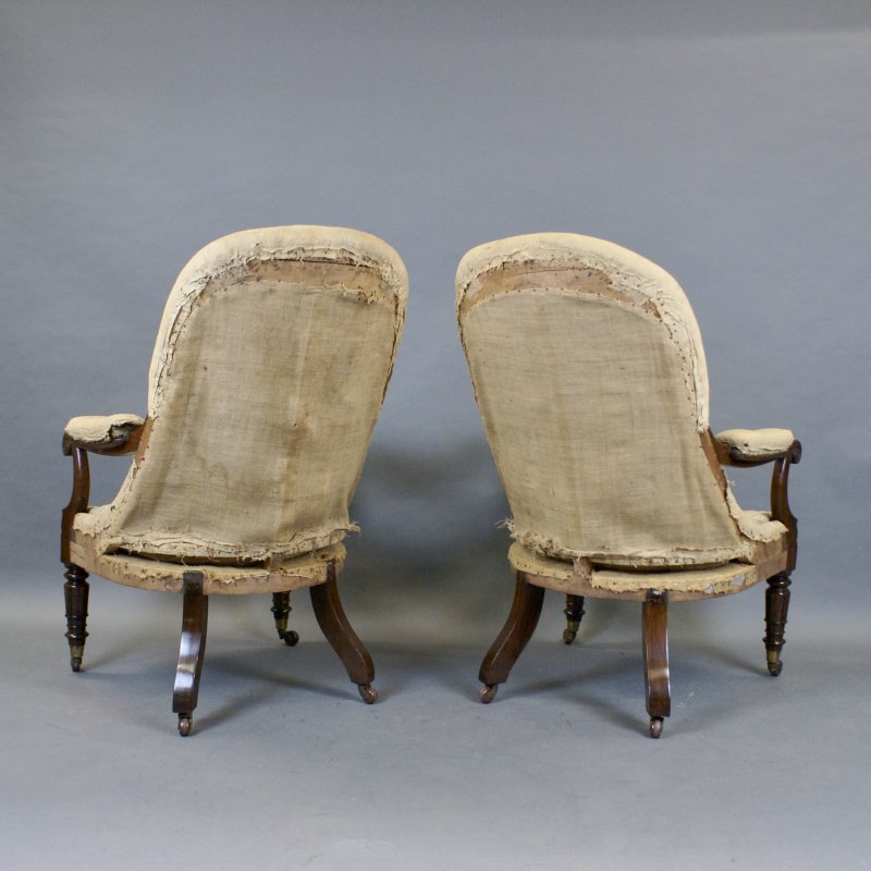 A Pair Of Victorian Rosewood Arm Chairs
