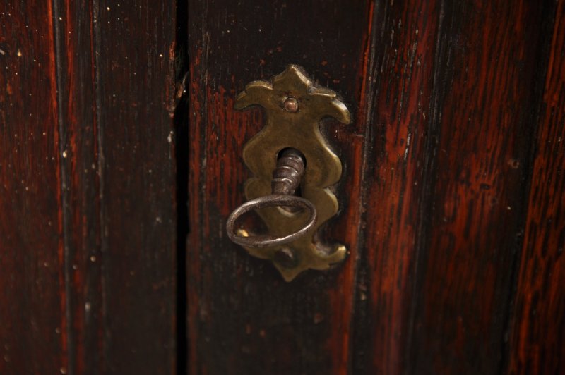 Early 18th Century Oak Bow Fronted Corner Cupboard