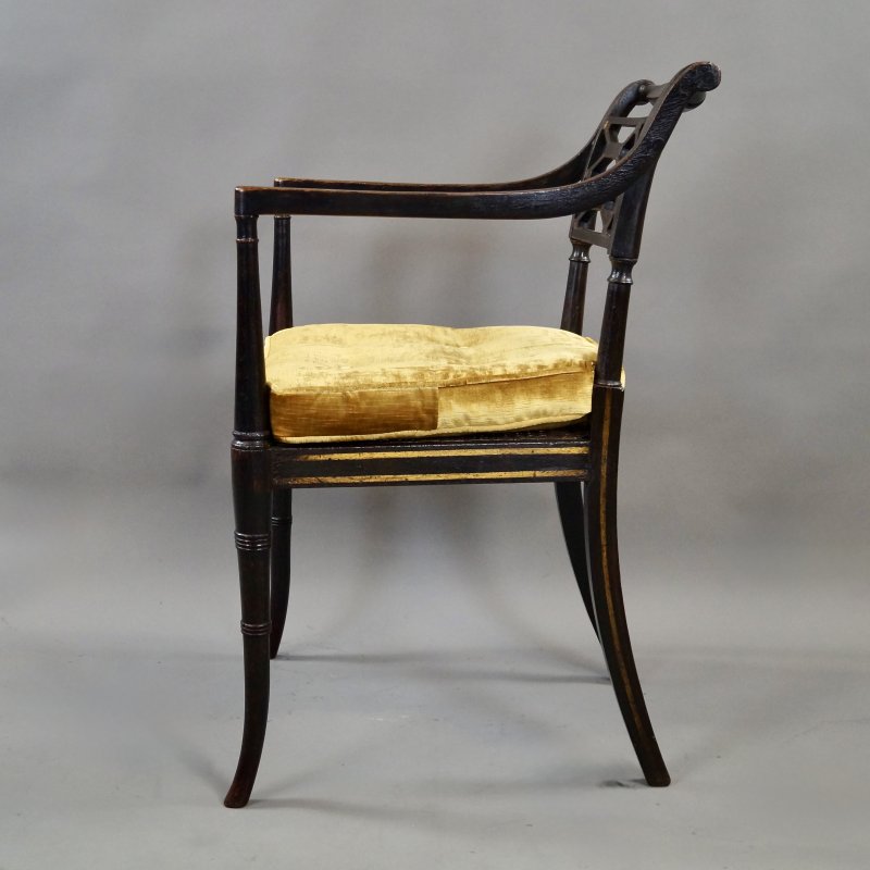 A Fine Regency Ebonised & Gilt Decorated Arm Chair