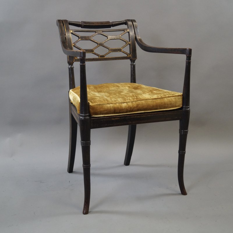 A Fine Regency Ebonised & Gilt Decorated Arm Chair