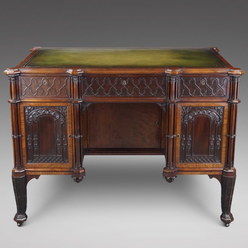 A superb Chippendale design mahogany Gothic revival desk