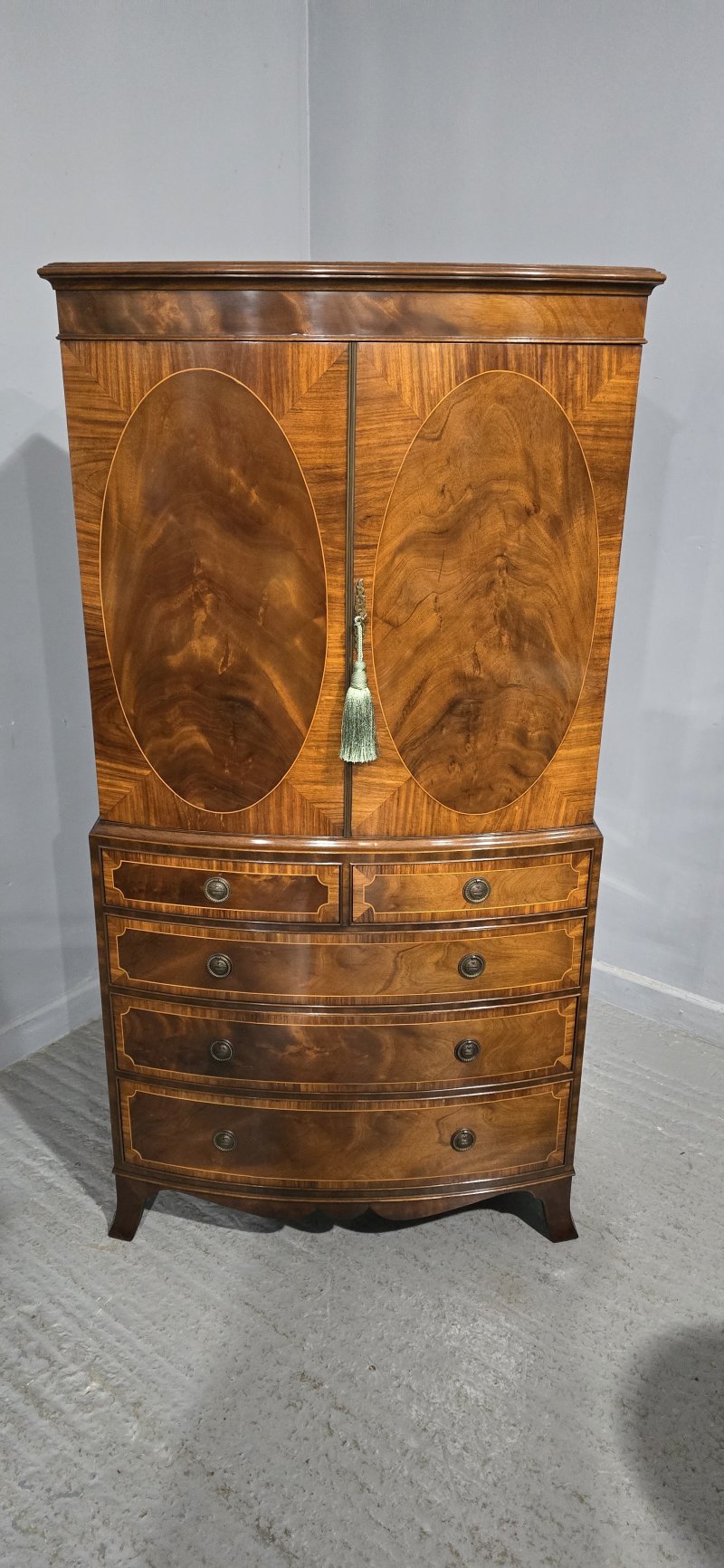 Superb Inlaid Bow Front Linen Press