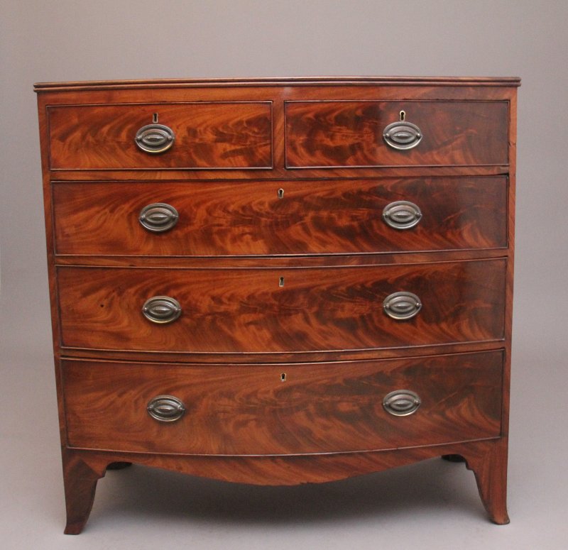 EARLY 19TH CENTURY FLAME MAHOGANY BOWFRONT CHEST OF DRAWERS