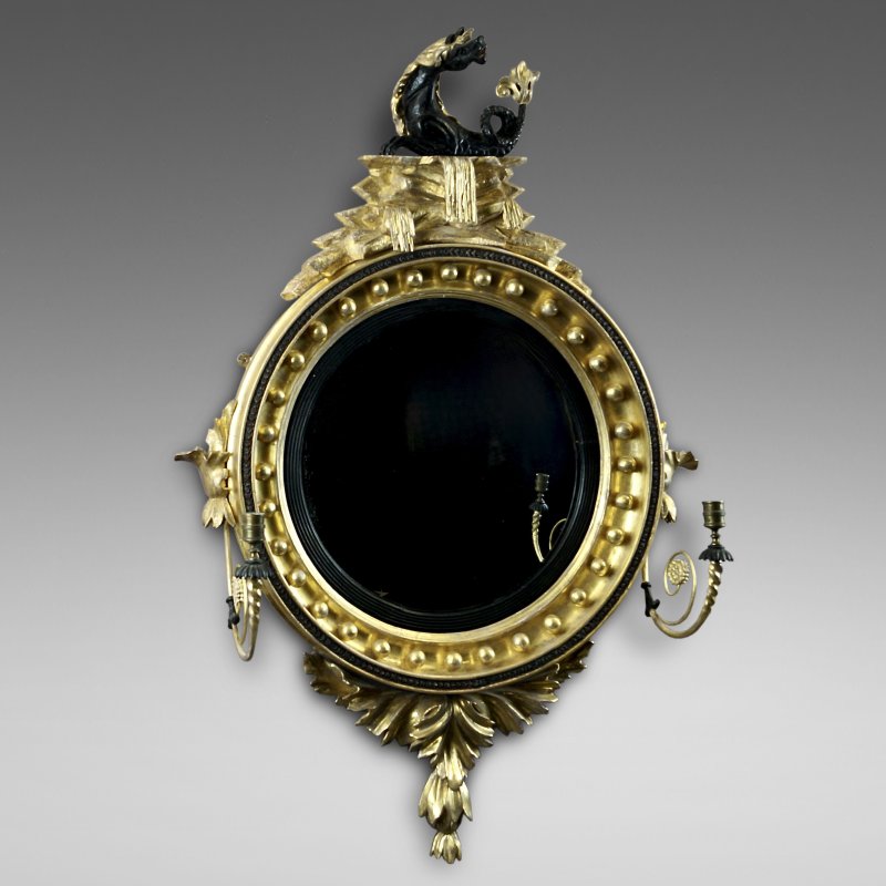 A Rare Regency Convex Gilt Wood Mirror