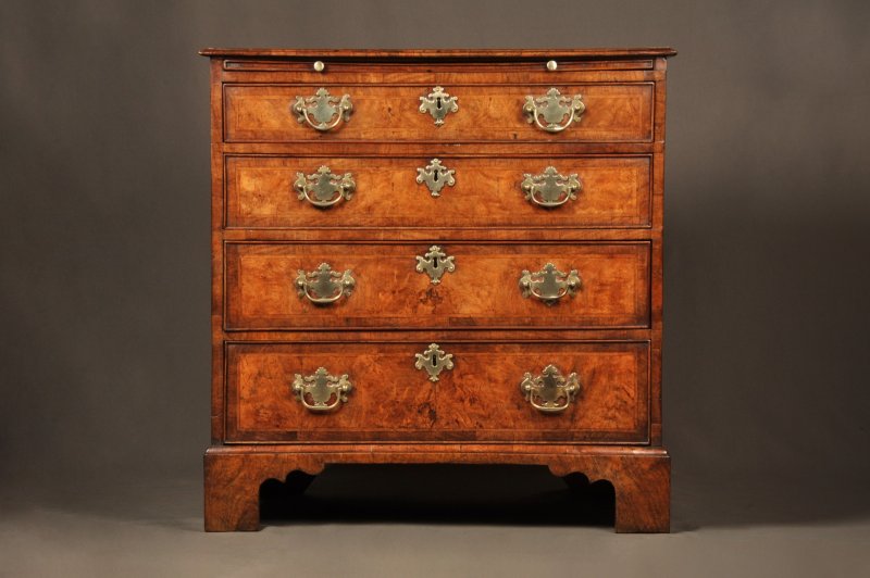 A Fine Early George II Walnut Chest Of Drawers Of Small Proportions